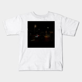 a car in the night Kids T-Shirt